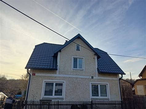 montáž střešní krytiny na rodinném domě