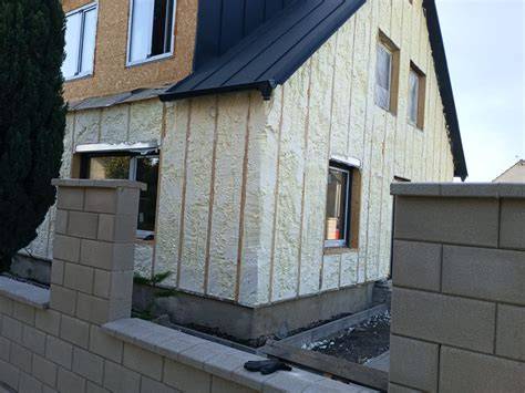 kombinované řešení soklové izolace a fasády